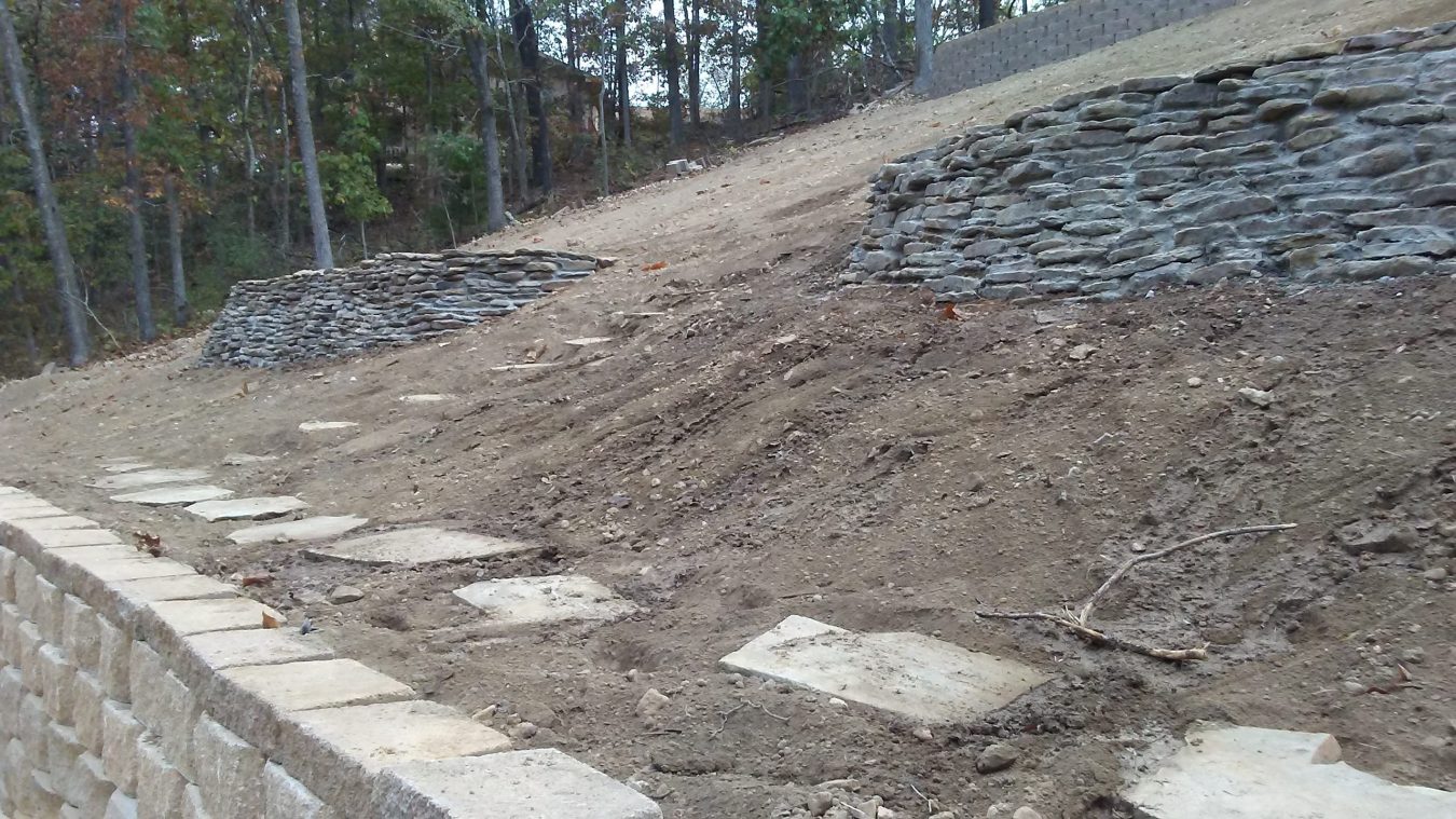 landscaping with native stone walls and native stone pathways 