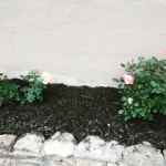 local landscaping stone garden bed built and designed by 2 J's & Sons lawn and landscaping