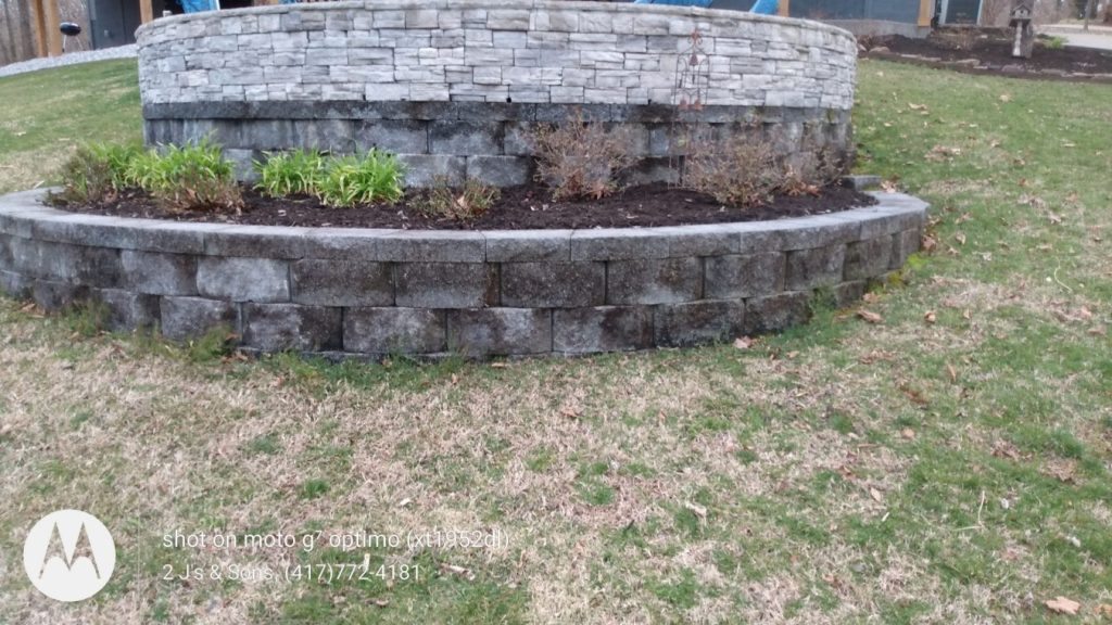 add new mulch to gardens