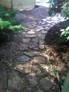 outdoor native stone pathway before leveling